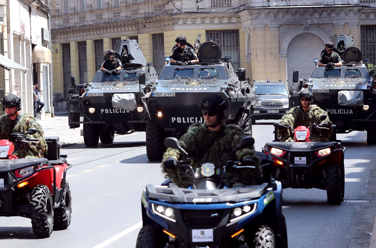 epa09315667 The police of the Federation of Bosnia and Herzegovina drive with armored vehicles and quads through the streets of Sarajevo, Bosnia and Herzegovina during Police Day, 01 July 2021. On Police Day, Bosnia and Herzegovina's police display some of their forces used to maintain safety.  EPA/FEHIM DEMIR