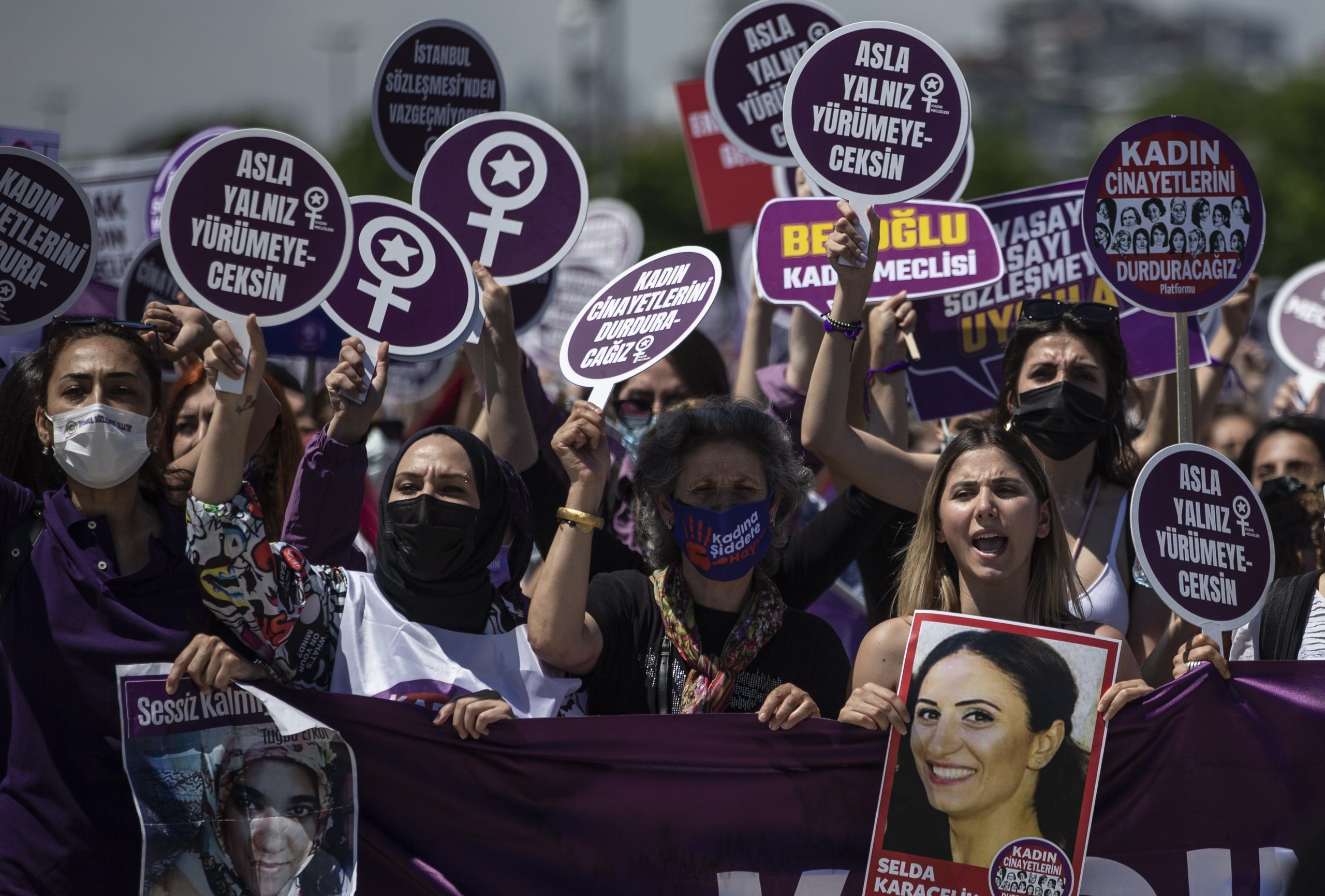 epa09285589 Women hold placards and shout slogans during a rally against Turkey's withdrawal from Istanbul Convention in Istanbul, Turkey, 19 June 2021. Turkish President Recep Tayyip Erdogan pulled Turkey out of the Istanbul Convention, which is an international accord designed to protect women, which was started by the Council of Europe in 2011 for the Prevention of Violence against Women and Domestic Violence, and is signed by 45 European countries as well as the EU as an organization.  EPA/ERDEM SAHIN