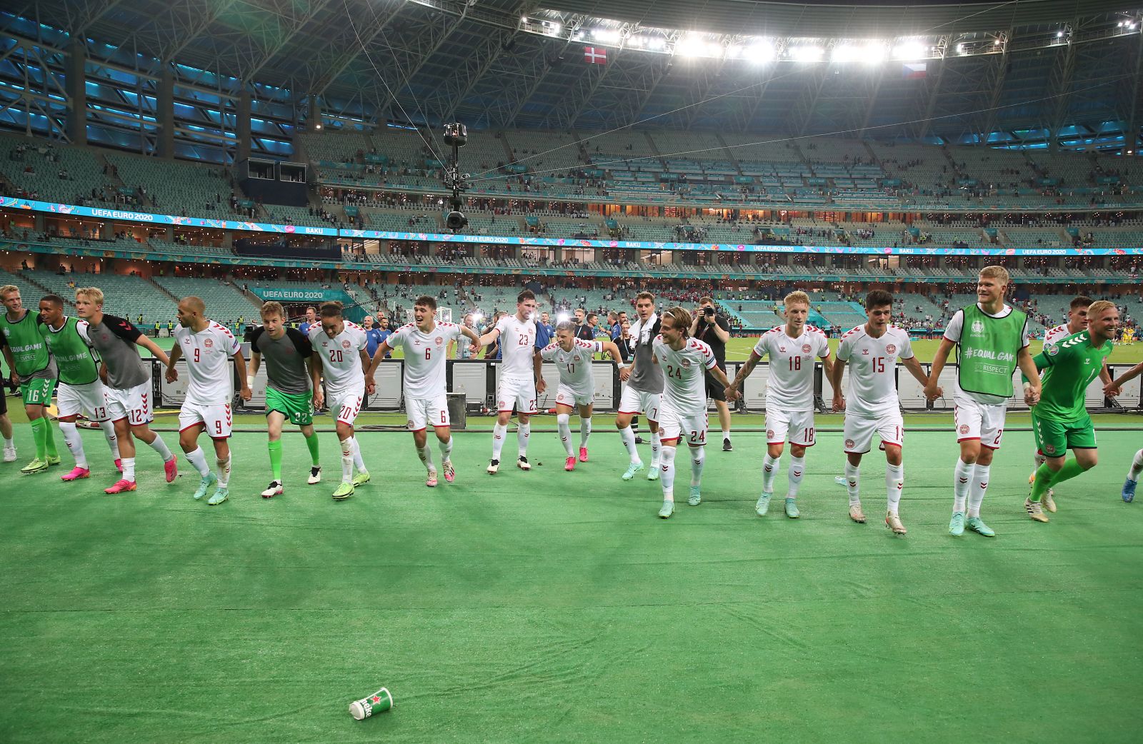 epa09321002 Players of Denmark celebrate after the UEFA EURO 2020 quarter final match between the Czech Republic and Denmark in Baku, Azerbaijan, 03 July 2021.  EPA/Tolga Bozoglu / POOL (RESTRICTIONS: For editorial news reporting purposes only. Images must appear as still images and must not emulate match action video footage. Photographs published in online publications shall have an interval of at least 20 seconds between the posting.)