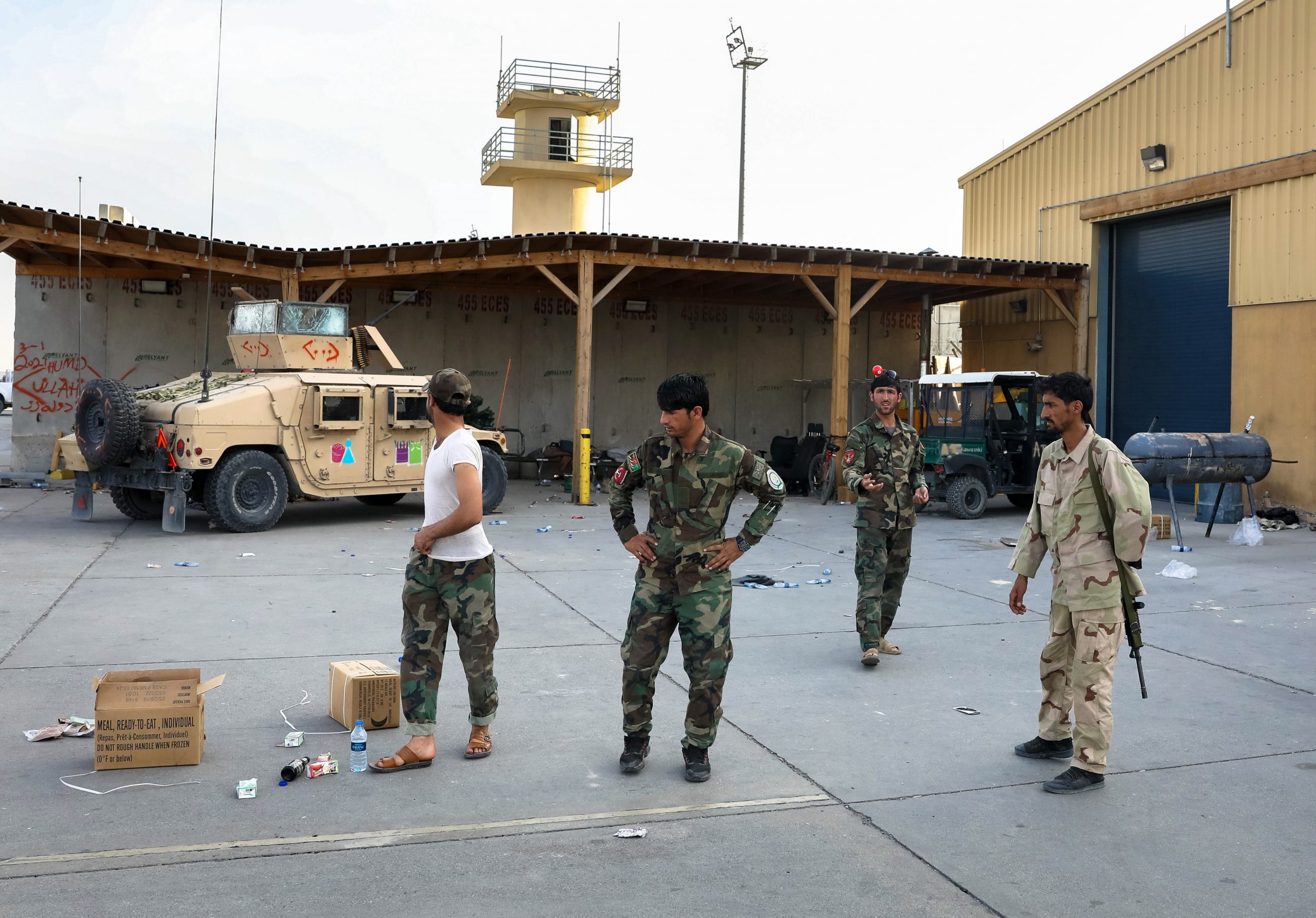 epa09324752 Afghan army soldiers keep watch inside the Bagram Air Base, some 50 kilometers north of the capital Kabul, Afghanistan, 05 July 2021.After nearly two decades, the US military has left the Bagram Airfield in central Afghanistan and has handed it over to Afghan National Defense and Security Forces on 02 July.  EPA/HEDAYATULLAH AMID