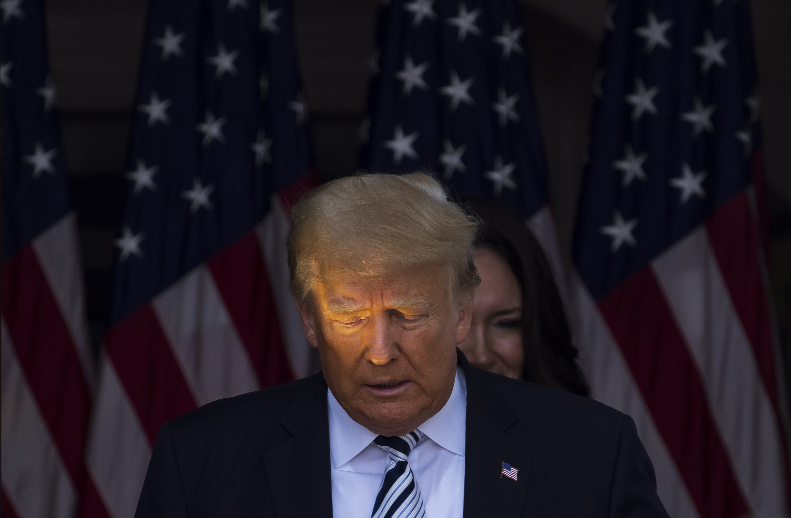 epa09329217 Former US President Donald J. Trump arrives for a press conference at Trump National Golf Club Bedminster in Bedminster, New Jersey, USA, 07 July 2021. At the event, Trump announced plans to file a class action lawsuit against Facebook and Twitter for alleged censorship.  EPA/JUSTIN LANE
