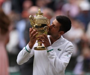 epa09337797 Novak Djokovic of Serbia poses for a photo with the trophy after winning the men's final against Matteo Berrettini of Italy at the Wimbledon Championships, Wimbledon, Britain 11 July 2021.  EPA/STEVE PASTON / POOL   EDITORIAL USE ONLY