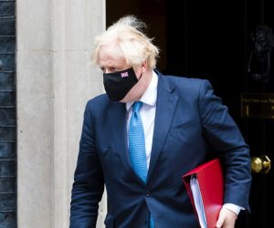 epa09343728 British Prime Minister Boris Johnson departs 10 Downing Street for Prime Minister Questions at parliament in London, Britain, 14 July 2021. Johnson faces the MPs' weekly question time in the House of Commons.  EPA/VICKIE FLORES