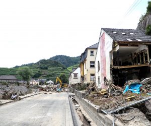 epa09358263 A view of a partially destroyed house after the flooding of the Ahr River, in Mayschoss in the district of Ahrweiler, Germany, 22 July 2021. Large parts of Western Germany were hit by heavy, continuous rain in the night to 15 July resulting in local flash floods that destroyed buildings and swept away cars.  EPA/FRIEDEMANN VOGEL