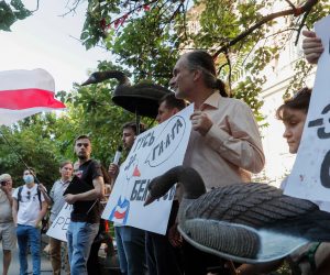 epa09359292 Belarusians living in Ukraine along with their supporters and Ukrainian activists hold placards and plastic gooses during a rally calling 'Goose for Belarus!', near the Belarus embassy in Kiev, Ukraine, 23 July 2021. According to protesters, they brought plastic gooses because the chatter of gooses resembles the name of the city of The Hague in Belarusian, Russian and Ukrainian languages (Ga-ga-ga - Gaaga) and as a reminder to Belarusian President Alexander Lukashenko about his liability for the persecution of the Belarusian opposition. A criminal complaint on behalf of four non-governmental organizations was filed On 19 May 2021 at the Pre-trial Chamber of the International Criminal Court (ICC) in The Hague.  EPA/SERGEY DOLZHENKO