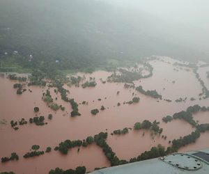 epa09359483 A handout photo made available by the Indian Navy while doing the helicopter sortie on 22 July 2021 shows an aerial view of the Ratnagiri district, Maharashtra, India, 22 July 2021 (issued 23 July 2021).  According to the district administration severe rainfall in Maharashtra killed at least 36 people and another 30 are feared trapped in three landslides in various areas.  EPA/INDIAN NAVY HANDOUT  HANDOUT EDITORIAL USE ONLY/NO SALES