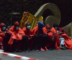 epa09362904 A view of some of the 44 migrants upon their arrival at the Restinga Port in El Hierro, Canary Islands, Spain, 24 July 2021.  EPA/Gelmert Finol