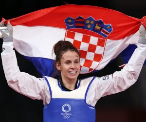 Tokio, 26.07.2021 - Hrvatska tekvondaica Matea Jelic (23) osvojila je naslov olimpijske pobjednice u kategoriji do 67 kilograma na Olimpijskim igrama u Tokiju, u finalu je uspjenija bila od Britanka Lauren Williams sa 25-21.
foto HINA/ Damir SENCAR/ ds