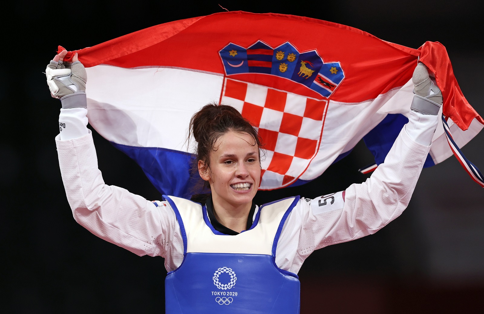 Tokio, 26.07.2021 - Hrvatska tekvondaica Matea Jelic (23) osvojila je naslov olimpijske pobjednice u kategoriji do 67 kilograma na Olimpijskim igrama u Tokiju, u finalu je uspjenija bila od Britanka Lauren Williams sa 25-21.
foto HINA/ Damir SENCAR/ ds