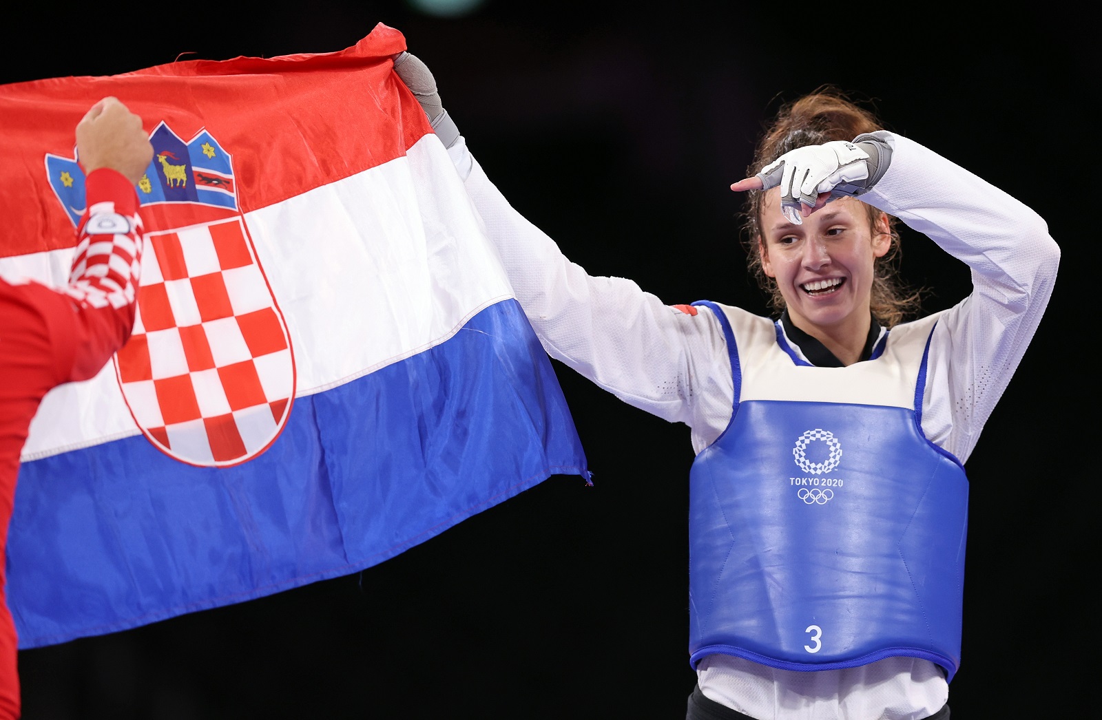 Tokio, 26.07.2021 - Hrvatska tekvondaica Matea Jelic (23) osvojila je naslov olimpijske pobjednice u kategoriji do 67 kilograma na Olimpijskim igrama u Tokiju, u finalu je uspjenija bila od Britanka Lauren Williams sa 25-21.
foto HINA/ Damir SENCAR/ ds