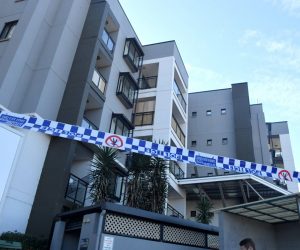 epa09371980 Police tape is seen at an apartment building that was put under lockdown at Devitt Street in the south western suburb of Blacktown in Sydney, Australia, 28 July 2021. NSW police are out guarding an apartment block in Devitt Street, Blacktown whose residents have been placed in isolation overnight. It's understood that health officials discovered several COVID-19 cases inside the building were linked, with fears that a super-spreading event may have occurred.  EPA/MICK TSIKAS  AUSTRALIA AND NEW ZEALAND OUT