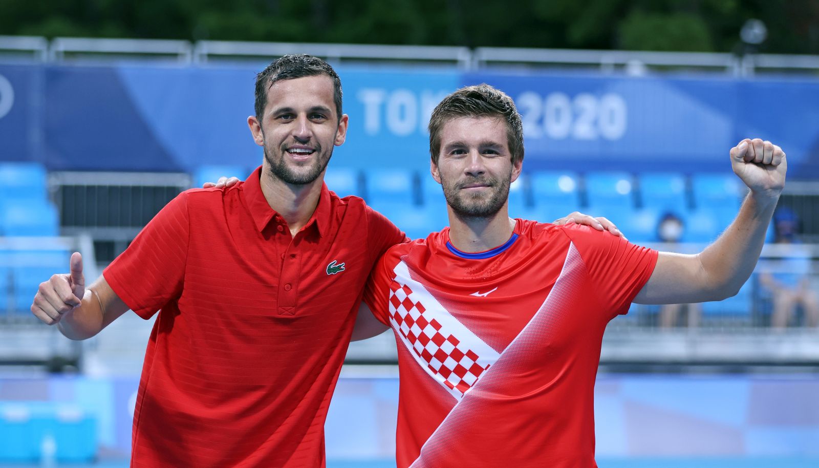 Tokio, 29.07.2021 - Hrvatski teniski par Mate Pavic i Nikola Metic izborili su finale Olimpijskih igara Tokio 2020 nakon pobjede protiv americkog para Austina Krajiceka i Tennysa Sandgrena.
foto HINA/ Damir SENCAR/ ds