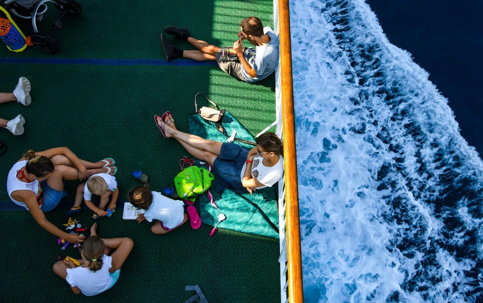 31.07.2019. Split -  Turisti uzivaju na trajektu Petar Hektorovic koji vozi na liniji Split - Vis  Photo: Josip Regovic/PIXSELL