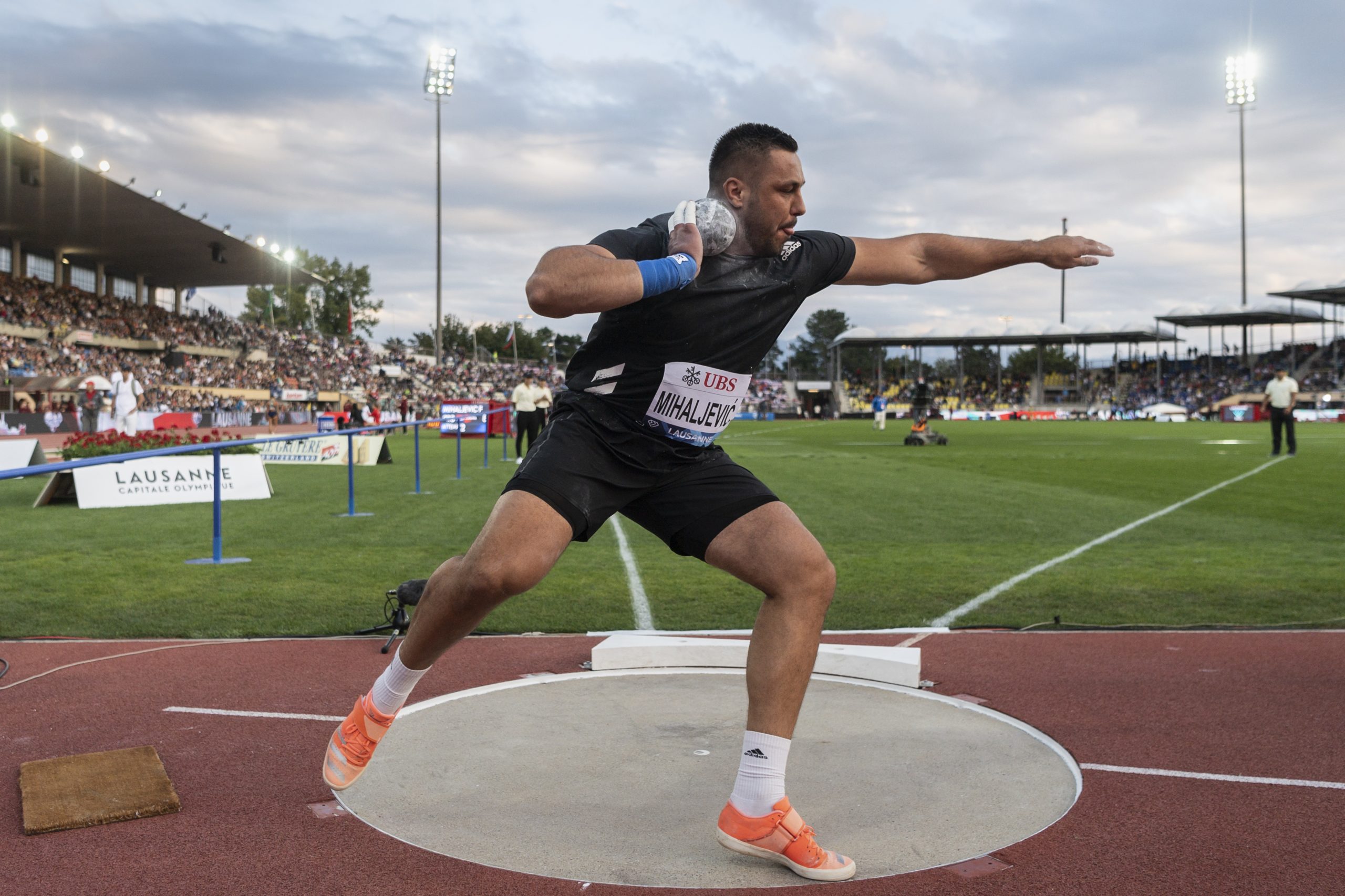 Filip Mihaljevic of Croatia competes in the men's shot put during the Athletissima IAAF Diamond League international athletics meeting at the Stade Olympique de la Pontaise in Lausanne, Switzerland, Thursday, Aug. 26, 2021. (Jean-Christophe Bott/Keystone via AP)