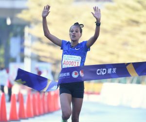 191208 -- XIAMEN, Dec. 8, 2019 -- Yalemzerf Yehualaw Densa of Ethiopia competes during the Xiamen Haicang International Half Marathon 2019 in Xiamen, southeast China s Fujian Province, Dec. 8, 2019.  SPCHINA-XIAMEN-XIAMENHAICANG INT L HALF MARATHON 2019 CN LinxShanchuan PUBLICATIONxNOTxINxCHN