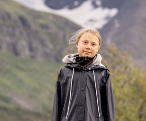epa09342983 Climate activist Greta Thunberg poses for a photo by the Ahkka mountain at the world heritage site of the Laponia area in Sapmi, Sweden, 13 July 2021.  EPA/CARL-JOHAN UTSI  SWEDEN OUT