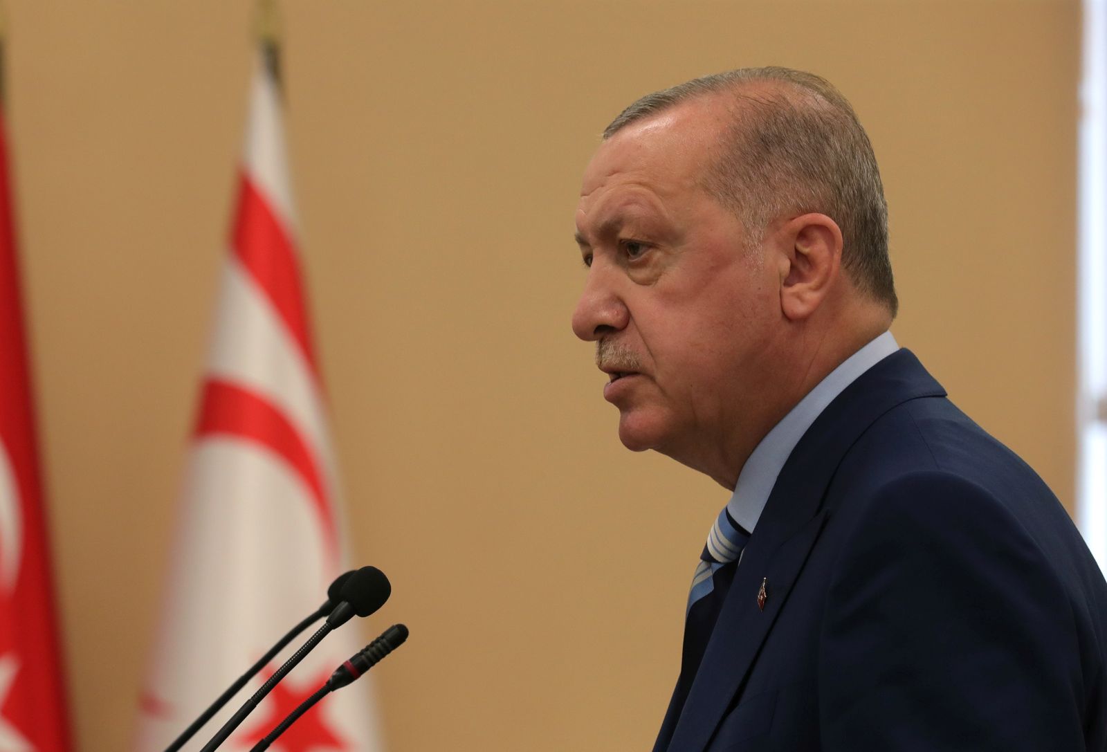 epa09353510 A handout photo made available by the Turkish President Press office shows Turkish President Recep Tayyip Erdogan speaking at the Turkish Cypriots parliament in the Turkish-administered northern part of the divided capital Nicosia, Cyprus, 19 July 2021. Erdogan is in Northern Cyprus for celebrations of 47th anniversary of the Turkey’s Peace Operation in Cyprus.  EPA/TURKISH PRESIDENT PRESS OFFICE HANDOUT  HANDOUT EDITORIAL USE ONLY/NO SALES