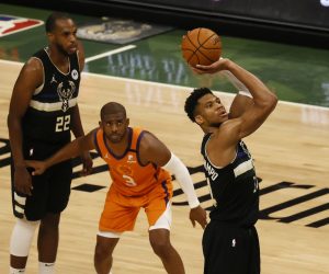 epaselect epa09355806 Milwaukee Bucks forward Giannis Antetokounmpo (C) hits free throws in the fourth quarter of game six of the NBA Finals basketball series between the Phoenix Suns and the Milwaukee Bucks at Fiserv Forum in Milwaukee, Wisconsin, USA, 20 July 2021. The Bucks lead the best-of-seven series 3-2 and can clinch the NBA Finals with a win.  EPA/TANNEN MAURY SHUTTERSTOCK OUT