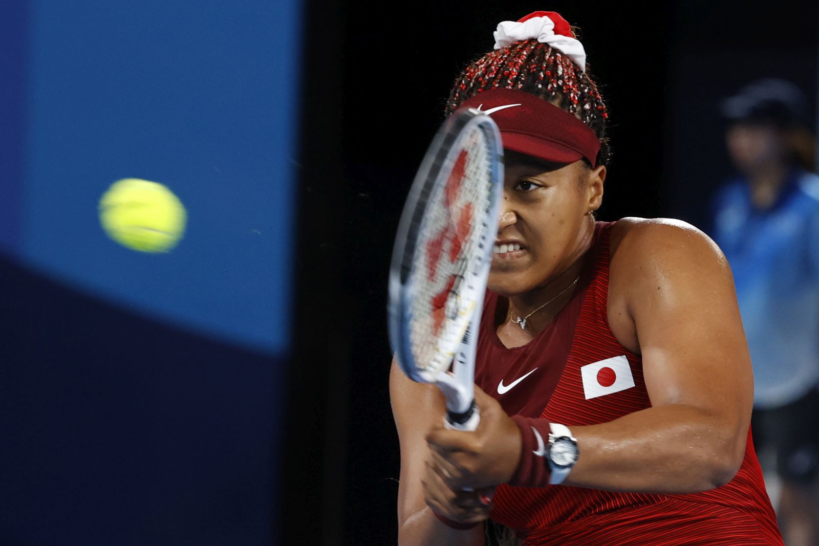 epa09368822 Naomi Osaka of Japan in action against Marketa Vondrousova of the Czech Republic during the Women's Singles Third Round Tennis events of the Tokyo 2020 Olympic Games at the Ariake Coliseum in Tokyo, Japan, 27 July 2021.  EPA/MICHAEL REYNOLDS