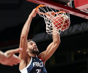 epa09374194 Rudy Gobert of France slam dunk during the Men's Basketball preliminary round Group B match between Czech Republic and France at the Tokyo 2020 Olympic Games at the Saitama Super Arena in Saitama, Japan, 28 July 2021.  EPA/WU HONG