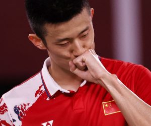 epa09381630 Chen Long of China celebrates after winning his men's singles quarterfinal match against Chou Tien-Chen of Taiwan at the Badminton events of the Tokyo 2020 Olympic Games at the Musashino Forest Sport Plaza in Tokyo, Japan, 31 July 2021.  EPA/MAST IRHAM
