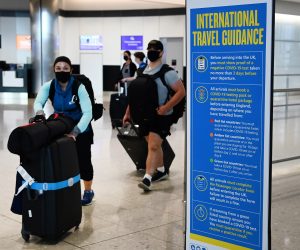 epa09382781 Passengers arrive at Heathrow Airport in London, Britain, 31 July 2021. Britain is set to open its borders to double jabbed US and EU citizens from 02 August, the UK government has announced.  EPA/ANDY RAIN