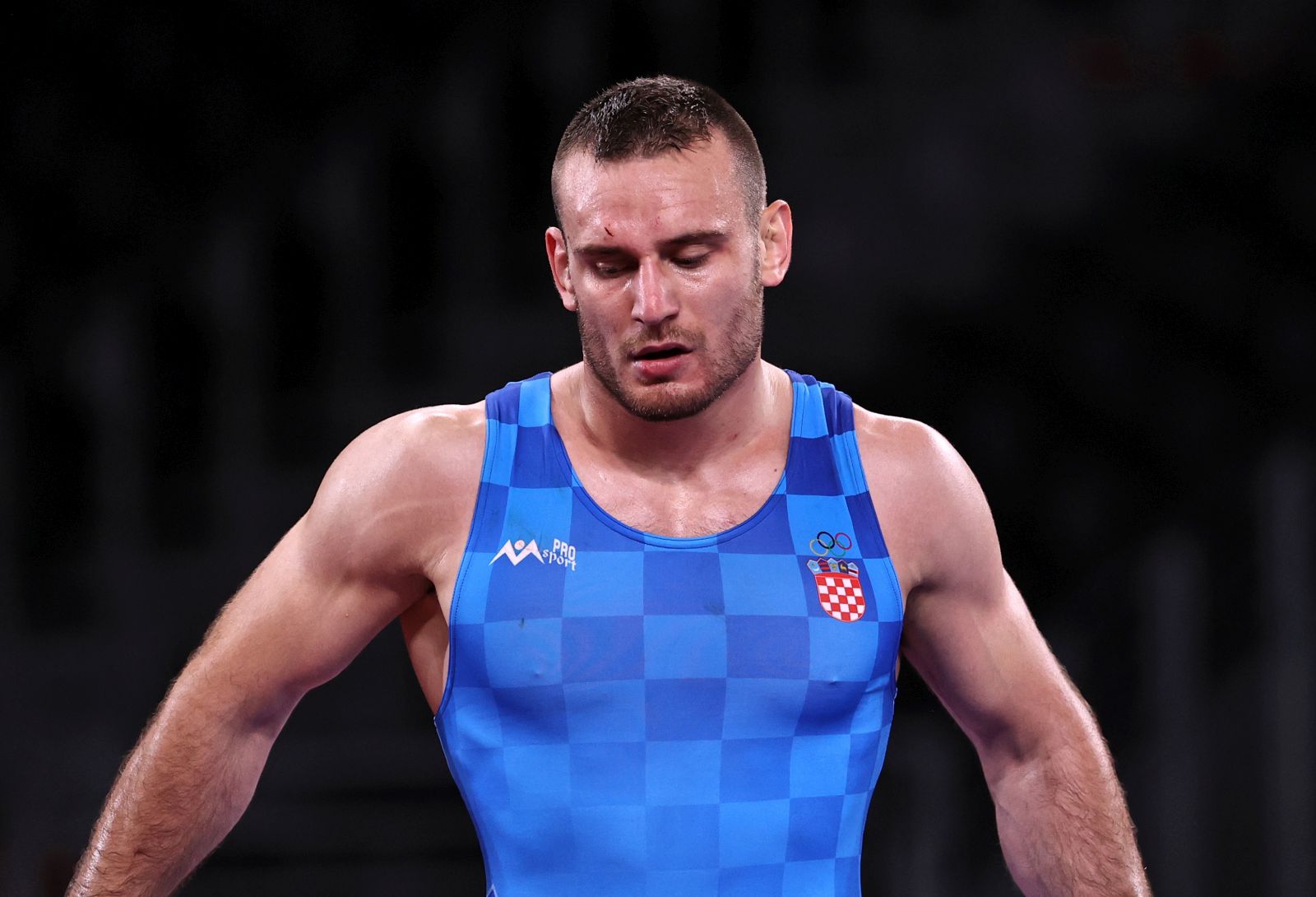Tokio, 03.08.2021 - Hrvac Ivan Huklek pobijedio je u cetvrtfinalu kategorije do 87 kilograma grcko-rimskim stilom na OI u Tokiju Uzbekistanca Rustama Asakalova na bodove 4-1.
foto HINA/ Damir SENCAR/ ds