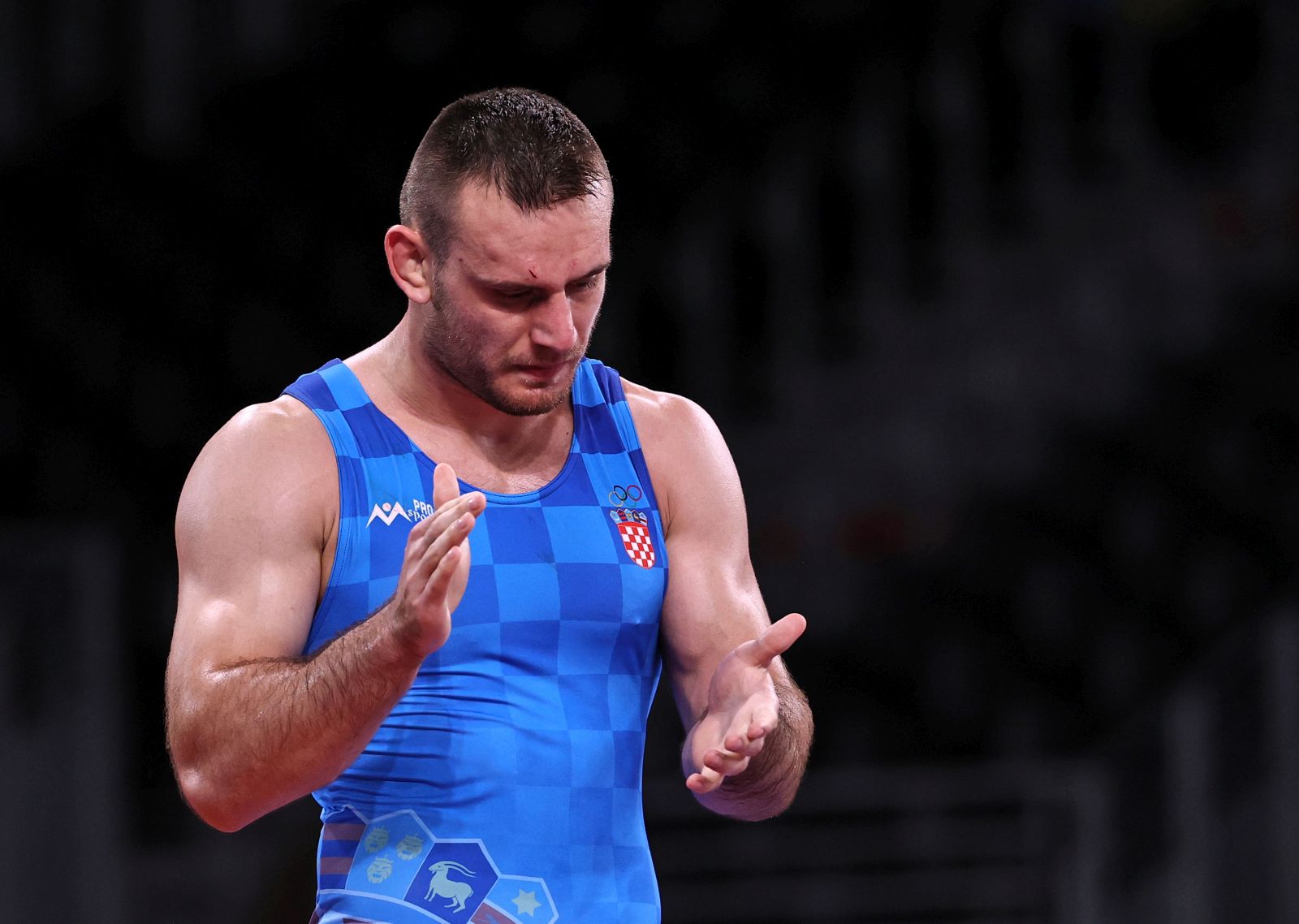 Tokio, 03.08.2021 - Hrvac Ivan Huklek pobijedio je u cetvrtfinalu kategorije do 87 kilograma grcko-rimskim stilom na OI u Tokiju Uzbekistanca Rustama Asakalova na bodove 4-1.
foto HINA/ Damir SENCAR/ ds