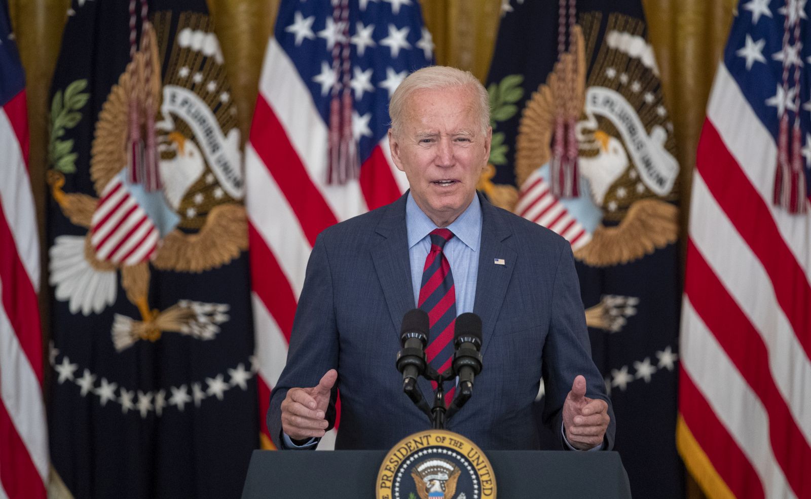 epa09392676 US President Joe Biden delivers remarks on the efforts to get more Americans vaccinated and the spread of the Delta variant in East Room of the White House in Washington, DC, USA, 03 August 2021.  EPA/SHAWN THEW