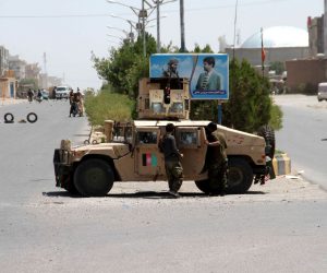 epa09400533 Afghan security officials patrol after they took back control of parts of Herat city following intense battle with Taliban militants, in Herat, Afghanistan, 06 August 2021. Heavy fighting continued in Kandahar, Lashkargah, and Herat cities as the Taliban continued pressing on with their surge in Afghanistan and breaking through a tough resistance by the government forces. The fighting in Herat displaced hundreds of families as people left their houses to seek refuge in central parts of the city, mostly settling with relatives.  EPA/JALIL REZAYEE