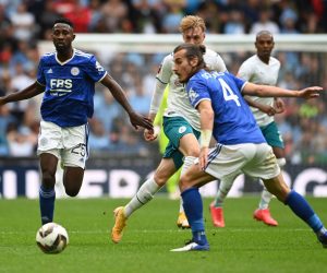 epa09404375 Caglar Soyuncu (R) and Wilfred Ndidi (L) of Leicester in action against Cole Palmer (C) of Manchester City during the FA Community Shield soccer match between Leicester City and Manchester City at the Wembley stadium in London, Britain, 07 August 2021.  EPA/Andy Rain EDITORIAL USE ONLY. No use with unauthorized audio, video, data, fixture lists, club/league logos or 'live' services. Online in-match use limited to 120 images, no video emulation. No use in betting, games or single club/league/player publications.
