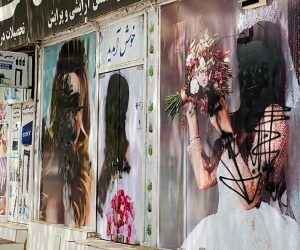 epa09421708 A view of the defaced posters of models on the walls of a beauty saloon in Kabul, Afghanistan, 20 August 2021. The Afghan interim council, formed to assist in the power transfer following President Ashraf Ghani's escape, has met several Taliban leaders to discuss issues related to control and security during the transition process. Fighting and violence have significantly reduced in Afghanistan with the surrender of the government troops and the resounding victory of the Taliban.  EPA/STRINGER
