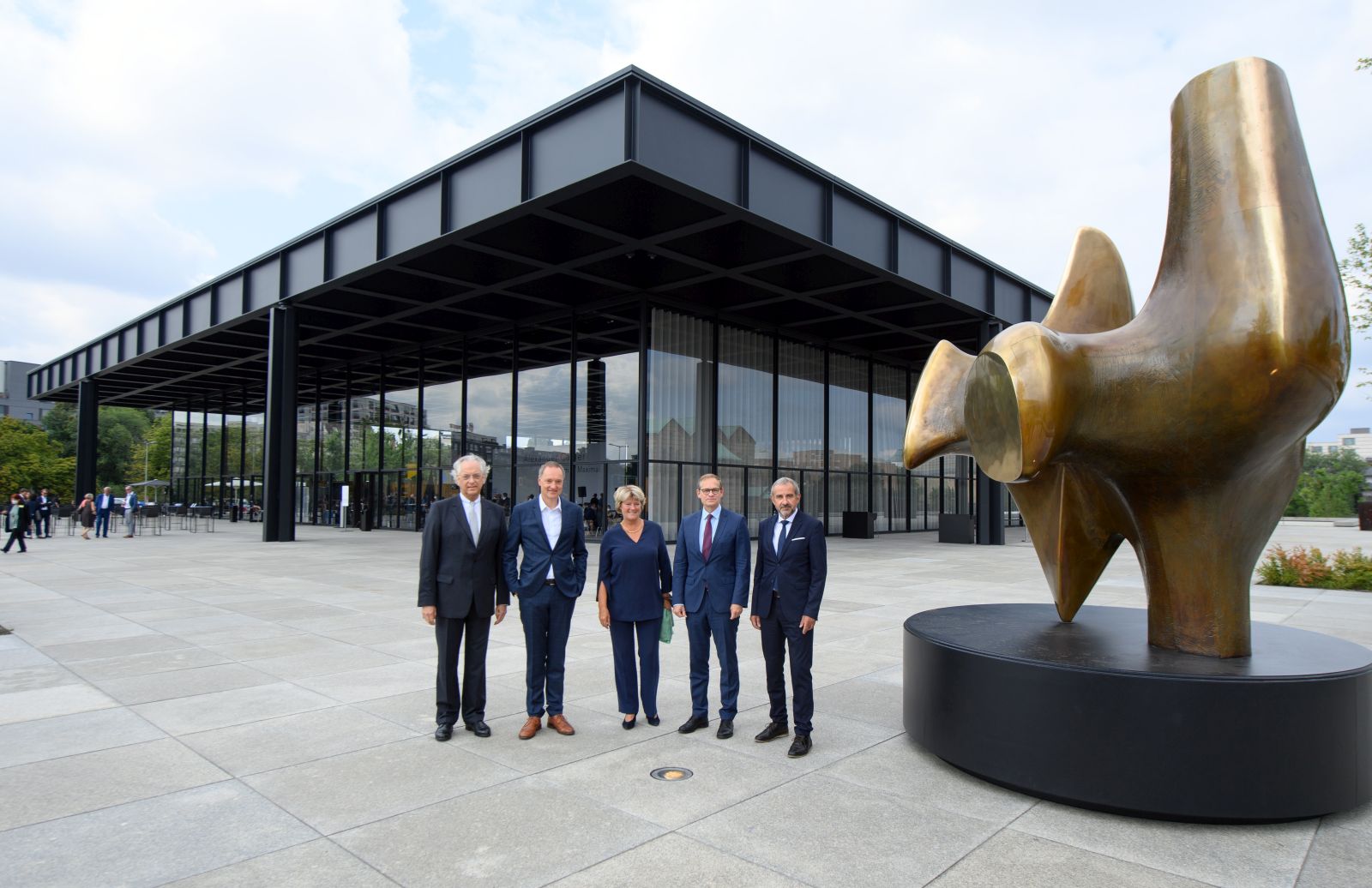 epa09423023 (L-R) Director-general of the Staatliche Museen zu Berlin Michael Eissenhauer, museum director Joachim Jaeger, German Federal Government Commissioner for Culture and the Media Monika Gruetters, Governing Mayor of Berlin Michael Mueller, and Hermann Parzinger, President der Stiftung Preussischer Kulturbesitz (Prussian Cultural Heritage Foundation), attend the ceremony marking the reopening of the modern art forum Neue Nationalgalerie in Berlin, Germany, 21 August 2021. A team led by British architect David Chipperfield has renovated and repaired the building, which was originally built according to plans by German avant-garde architect Ludwig Mies van der Rohe and opened in 1968.  EPA/Soeren Stache / POOL