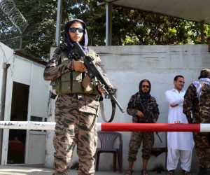 epa09428816 Taliban stands guard outside the office of Taliban's spokesman Zabiullah Mujahid, in Kabul, Afghanistan, 25 August 2021. Taliban spokesperson Zabiullah Mujahid said the group hopes to reach an agreement of an inclusive government soon. He said that the group wants better relations with international community and hopes that the international community will accept their government.  EPA/AKHTER GULFAM