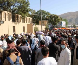 epa09428882 Afghans try to reach the airport after the Taliban announced they wouldn't allow access any longer, in Kabul, Afghanistan, 25 August 2021. Taliban spokesperson Zabiullah Mujahid said in a press conference on 24 August, that evacuation must be completed by August 31 and they will not allow Afghans to go to the airport from now on.  EPA/AKHTER GULFAM