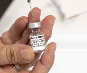 epa09432010 A nurse prepares a dose of the vaccine Pfizer-BioNtech against COVID-19 during the vaccination at the Arena 'Boris Trajkovski' in Skopje, Republic of North Macedonia, 27 August 2021. After a rapid increase in the number of newly infected with COVID-19, the Government adopted anti-covid measures against those who did not receive the vaccine. At the same time, the Macedonian government launched a campaign to convince its citizens that vaccination is the only way to stop the epidemic. North Macedonia is in the top ten in the world in terms of the number of deaths per one million from COVID-19.  EPA/GEORGI LICOVSKI