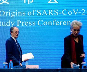FILE PHOTO: WHO team at a news conference in Wuhan FILE PHOTO: Peter Ben Embarek and Marion Koopmans, members of the World Health Organization (WHO) team tasked with investigating the origins of the coronavirus disease (COVID-19), arrive for the WHO-China joint study news conference at a hotel in Wuhan, Hubei province, China February 9, 2021. REUTERS/Aly Song/File Photo Aly Song
