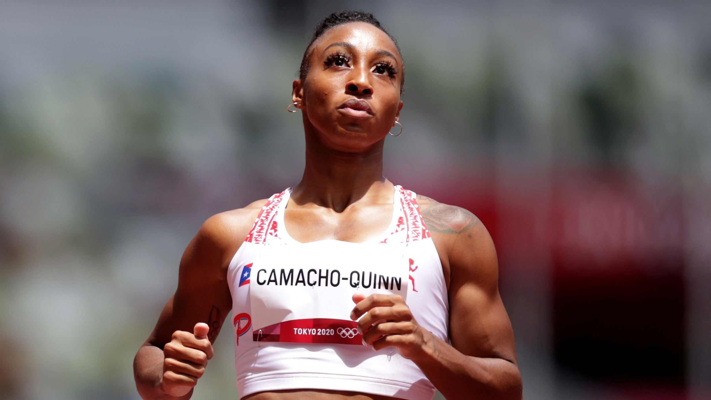 Athletics - Women's 100m Hurdles - Round 1 Tokyo 2020 Olympics - Athletics - Women's 100m Hurdles - Round 1 - OLS - Olympic Stadium, Tokyo, Japan - July 31, 2021.  Jasmine Camacho-Quinn of Puerto Rico wins Heat 5 REUTERS/Hannah Mckay HANNAH MCKAY