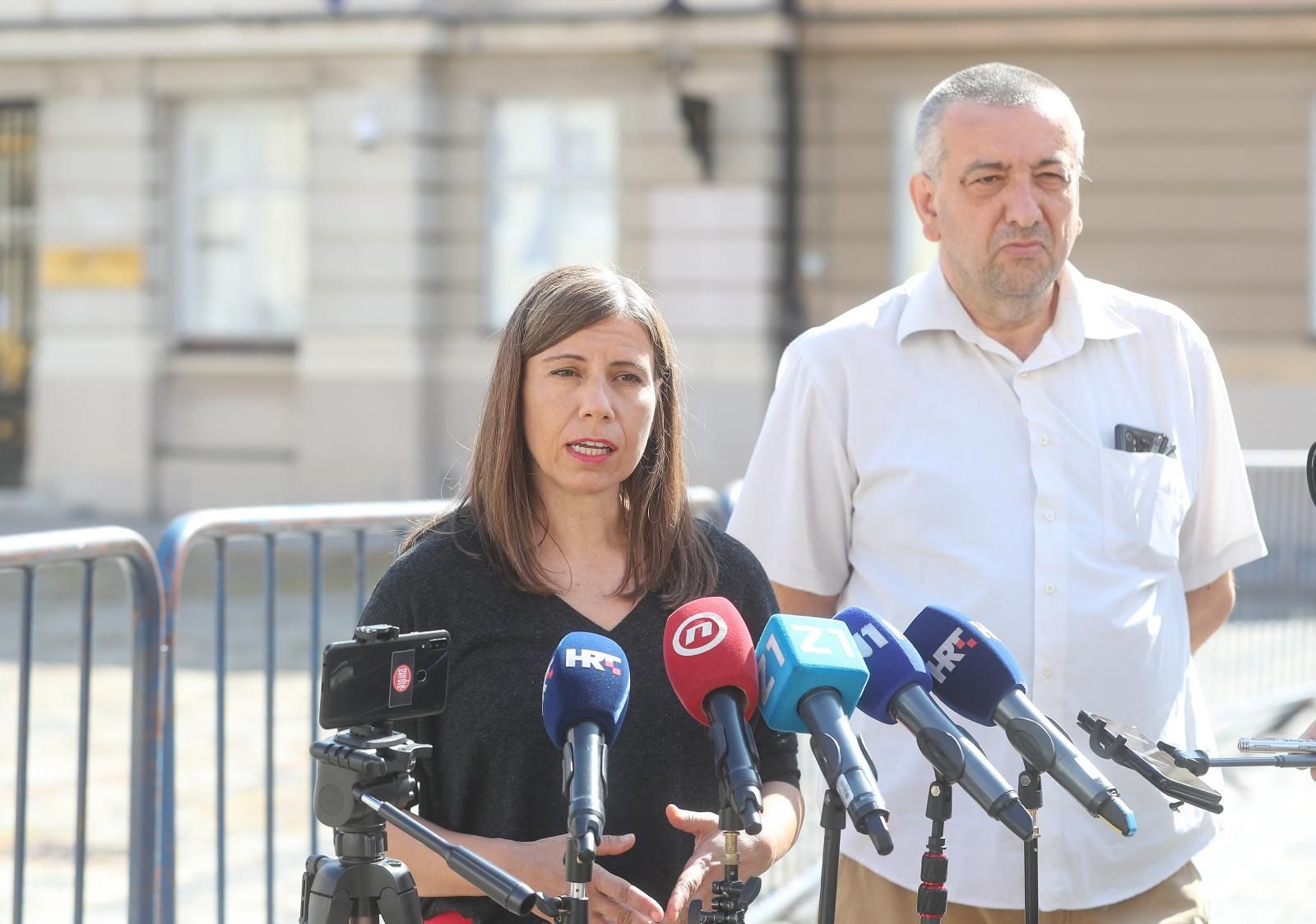 18.08.2021., Zagreb - Konferencija za medije radnicke fronte i Novog sindikata ispred sabora na temu stecaja tekstilne tvrtke Orljava. Katarina Peovic i Mario Ivekovic. 
Photo: Zeljko Lukunic/PIXSELL