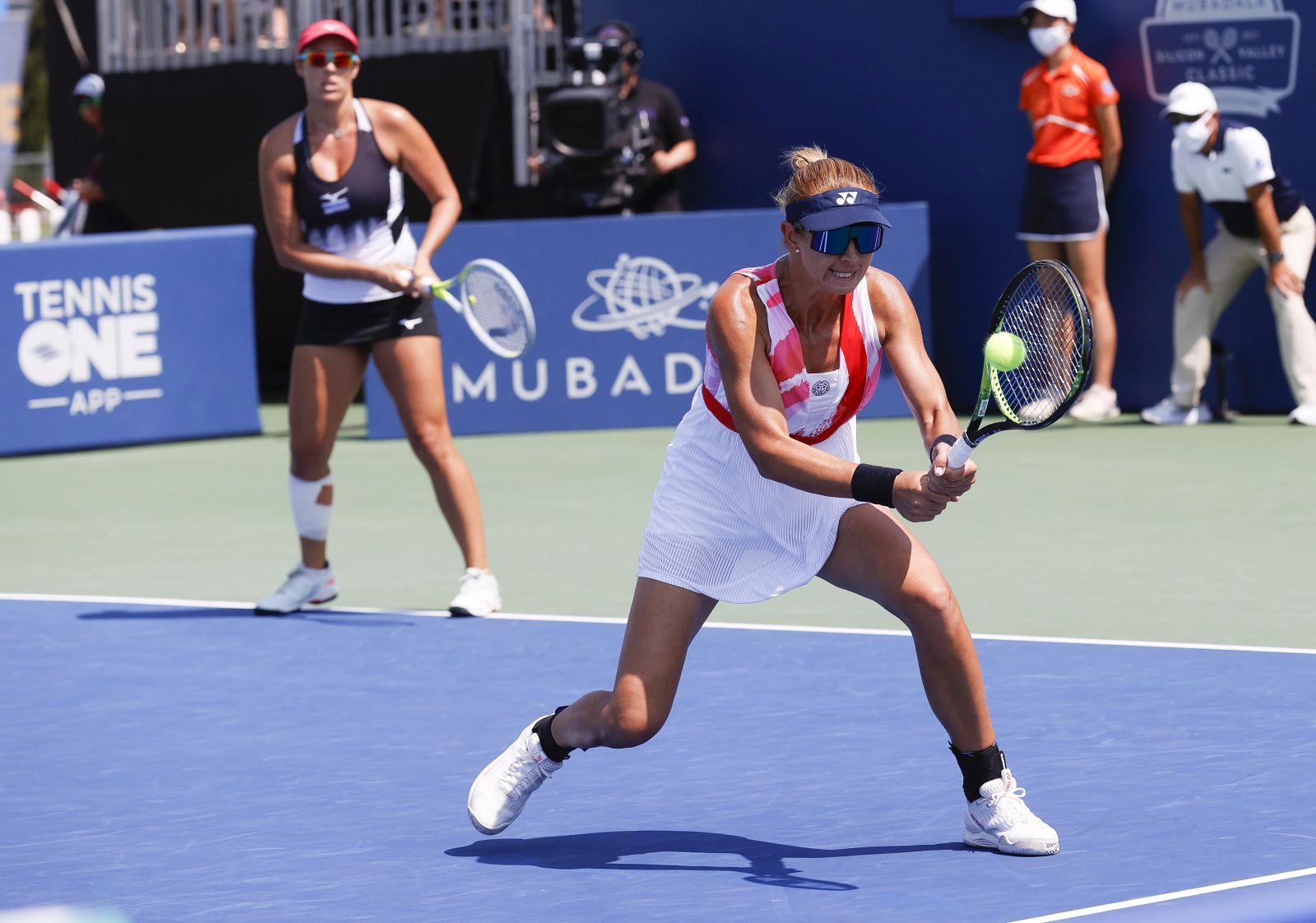 epa09406572 Darija Jurak of Croatia (R) and Andreja Klepac of Slovenia (L) in action against Gabriela Dabrowski of Canada and Luisa Stefani of Brazil during the Women's Mubadala Silicon Valley Classic tennis match doubles finals at San Jose State University in San Jose, California, USA, 08 August 2021.  EPA/JOHN G. MABANGLO