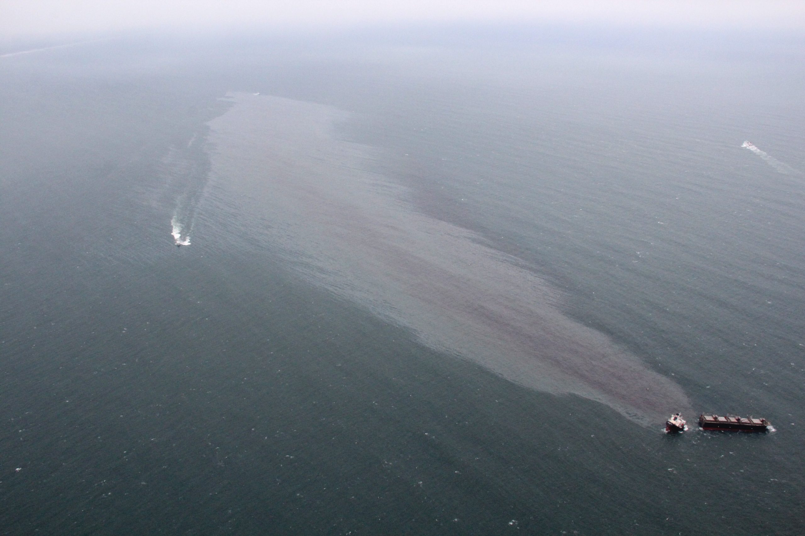 epa09411794 A handout photo made available by Japan's 2nd Regional Coast Guard Headquarters shows Panamanian-flagged cargo ship 'Crimson Polaris' off Hachinohe port in Aomori Prefecture, northeastern Japan, 12 August 2021. The Crimson Polaris have broken in two and is spilling oil after it ran aground on 12 August. All the crew members have been rescued.  EPA/JAPAN COAST GUARD HANDOUT  HANDOUT EDITORIAL USE ONLY/NO SALES