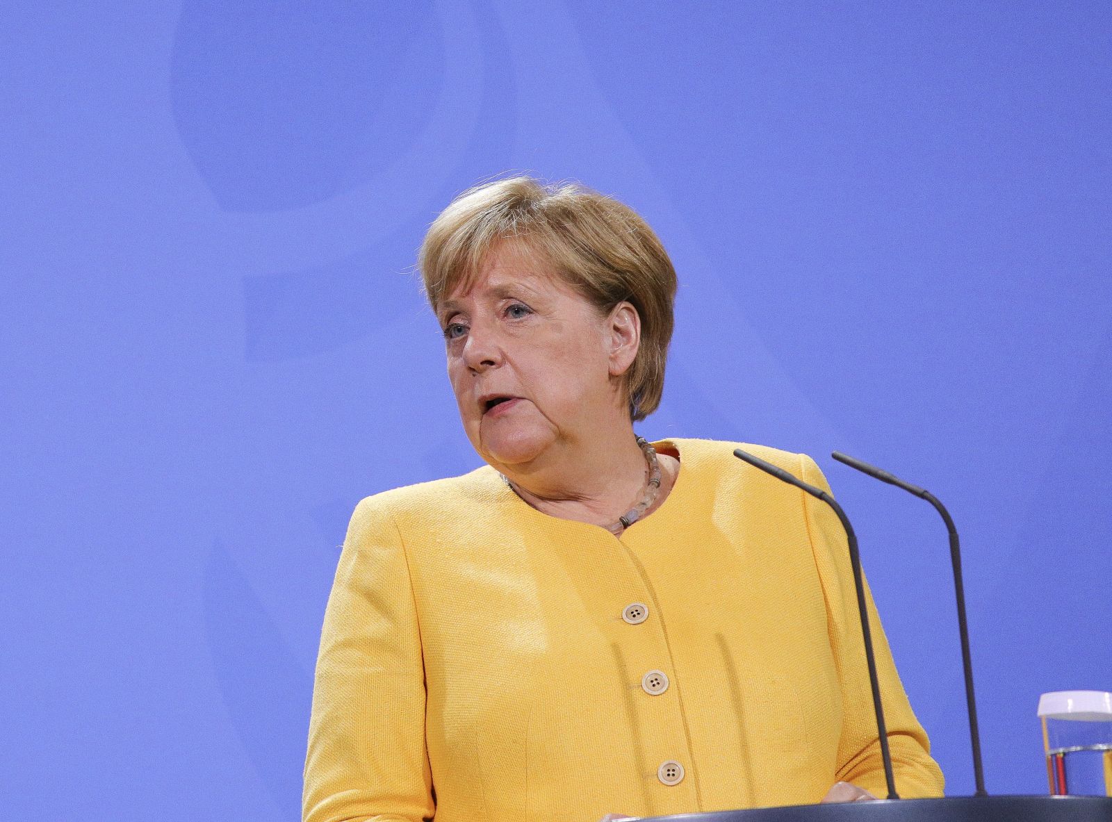 epa09416735 German Chancellor Angela Merkel gives a statement to the media regrading the current situation in Afghanistan, in Berlin, Germany, 16 August 2021. Taliban co-founder Abdul Ghani Baradar on 16 August 20201 declared victory and end to the decades-long war in Afghanistan, a day after the insurgents entered Kabul to take control of the country. Baradar, who heads the Taliban political office in Qatar, released a short video message after President Ashraf Ghani fled and conceded that the insurgents had won the 20-year war.  EPA/OMER MESSINGER / POOL