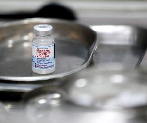 epa09429829 (FILE) - A vial of Moderna COVID-19 vaccine sits on a tray, in Hanoi, Vietnam, 27 July 2021 (reissued 26 August 2021). Japan's health ministry suspended the usage of around 1.6 million doses of Moderna COVID-19 vaccine after the discovery of foreign material in a production line.  EPA/LUONG THAI LINH