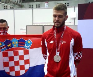 Tokio, 04.09.2021. - Posljednjeg natjecateljskog dana na Paraolimpijskim igrama u Tokiju, Hrvatska je stigla i do već sedme medalje nakon što je paratekvondaš Ivan Mikulić (26) u finalu kategorije +75 kg izgubio od Iranca Asghara Aziziaghdama sa 10-12 osvojivši srebro.
foto HINA/ Denis Lugarić/ ml