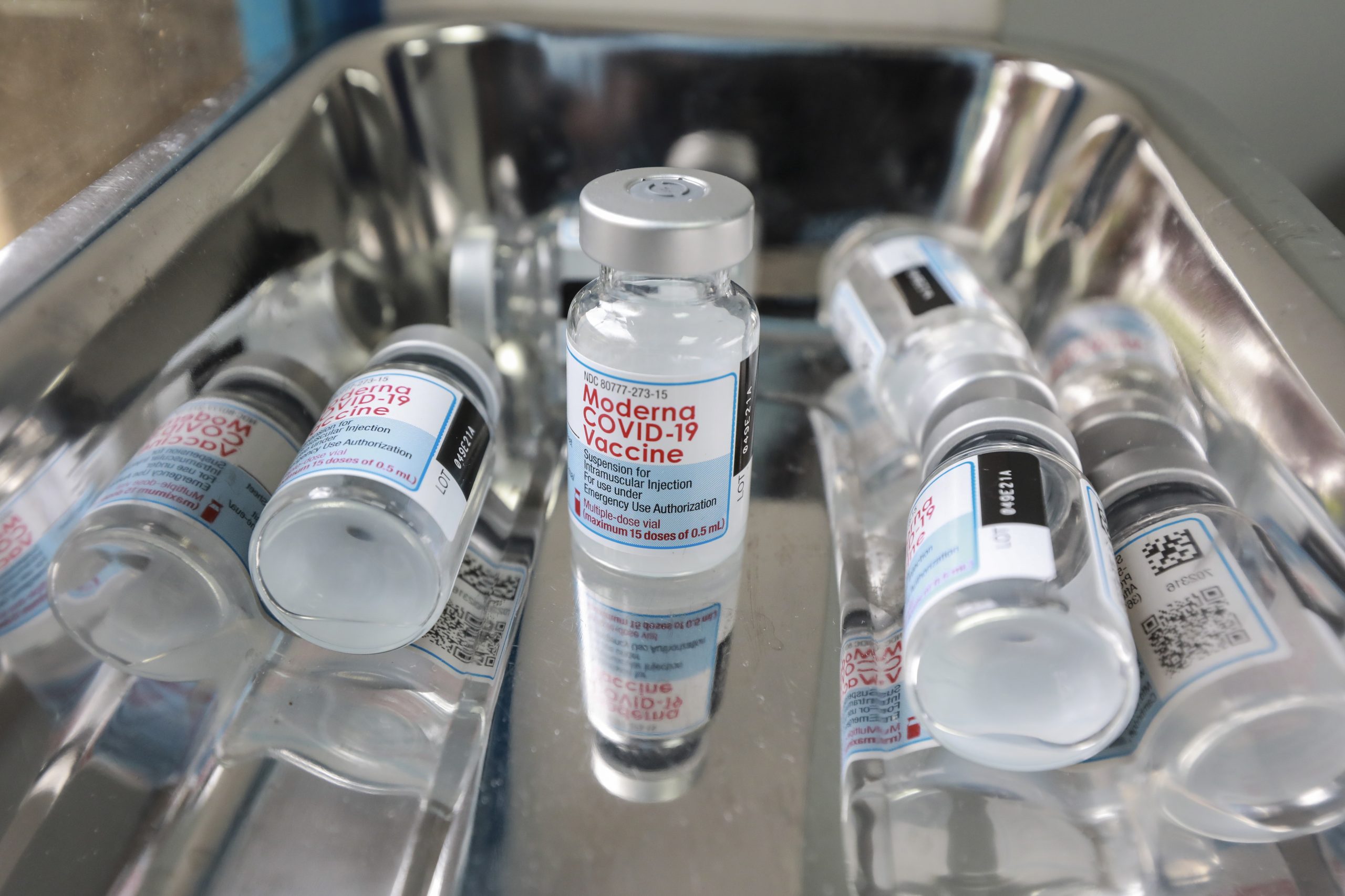 epa09452972 Empty vaccine vials of the Moderna vaccine against Covid-19 after being used to vaccinate Kenyans receiving their first dose of vaccination during a vaccination drive at the Uhai Neema hospital in Nairobi, Kenya, 07 September 2021. Kenya has started administering its citizens with the over 1.76 million doses of the Moderna Covid-19 vaccine donated by the United States via COVAX facility making it the second type of vaccine to be administered after the Oxford/AstraZeneca vaccine.  EPA/Daniel Irungu