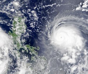 epa09459010 A handout satellite imaget made available by the National Aeronautics and Space Administration (NASA) of typhoon Chanthu as it churned the Philippine Sea, 09 September 2021 (issued 10 September 2021). On 09 September, by 11 p.m. Philippine Standard Time (1500 Universal Time), the typhoon was about 550 km east-northeast of Manila, with sustained winds of 220 kph. The typhoon, named 'Kiko' in the Philippines, is predicted to pass just north of the island of Luzon as a category 4 storm. It is likely to arrive at Taiwan on 11 or 12.  EPA/NASA HANDOUT  HANDOUT EDITORIAL USE ONLY/NO SALES