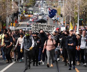 epa09474357 Victoria police clash with protesters during 'The Worldwide Rally for Freedom' in Melbourne, Victoria, Australia, 18 September 2021. The Worldwide Rally for Freedom is a purported day of rallies for 'freedom' across many countries, which is also labelled 'World Wide Demonstration 4.0'.  EPA/JAMES ROSS AUSTRALIA AND NEW ZEALAND OUT
