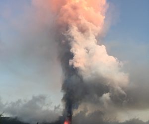 epa09477149 Smoke and magma rise to the sky from the volcanic eruption in El Paso, La Palma, Canary islands, Spain, 19 September 2021.  The area registered hundreds of small earthquakes along the week as magma pressed the subsoil on its way out. Regional authorities started to evacuate locals with mobility issues hours before the eruption took place.  EPA/Miguel Calero