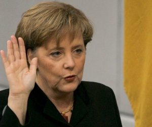 epa09477888 (FILE) - New German Chancellor Angela Merkel (L) takes the official oath of office to President of the Bundestag, Norbert Lammert, in Berlin, Germany, 22 November 2005 (re-issued 20 September 2021). Germany will hold general elections on 26 September 2021.  EPA/Peer Grimm GERMANY OUT *** Local Caption *** 00580356