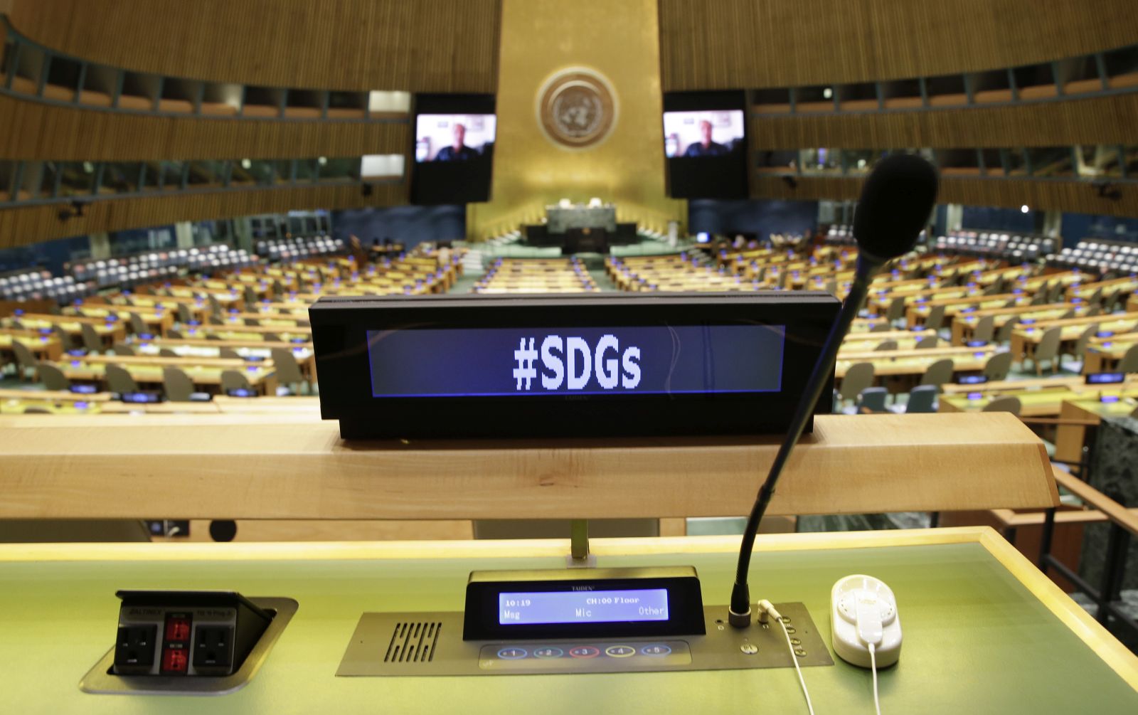 epa09478029 Empty desks fill the UN General Assembly Hall as speakers deliver remarks remotely at the SDG Moment event as part of the UN General Assembly 76th session General Debate at the United Nations Headquarters in New York City, USA, 20 September 2021. Sustainable Development Goals (SDG) are a blueprint for fighting poverty and hunger as well as confronting the climate crisis.  EPA/JOHN ANGELILLO / POOL